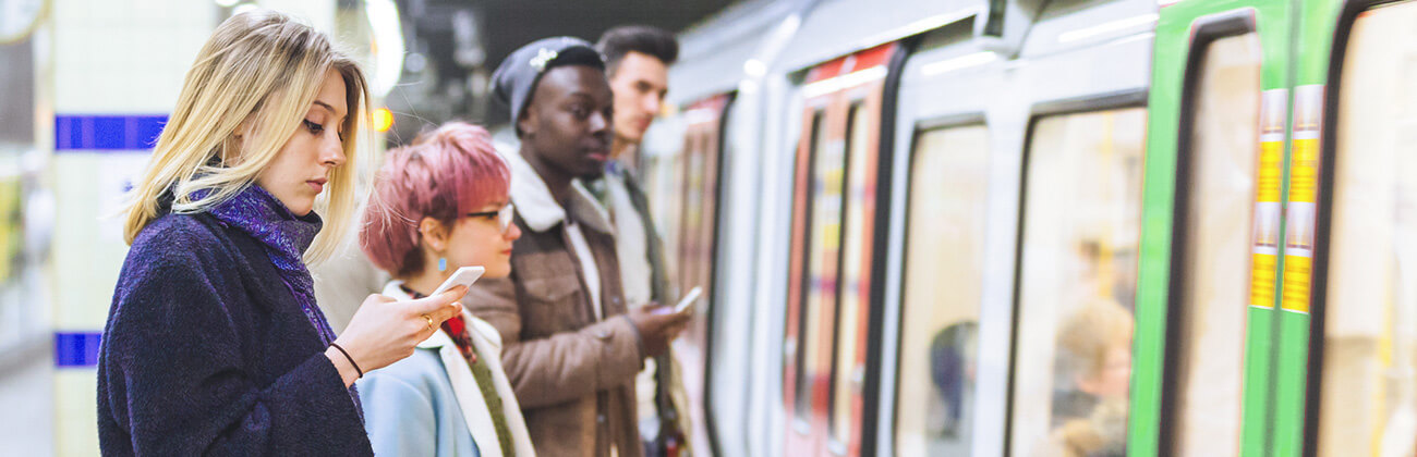 Metro-commuters-on-their-mobile-phones